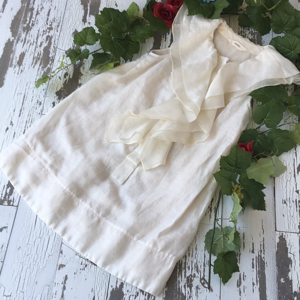 Dazzle cream sleeveless ruffle dress